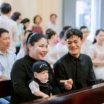 a family enjoys time together in a church setting, filled with warmth and happiness.