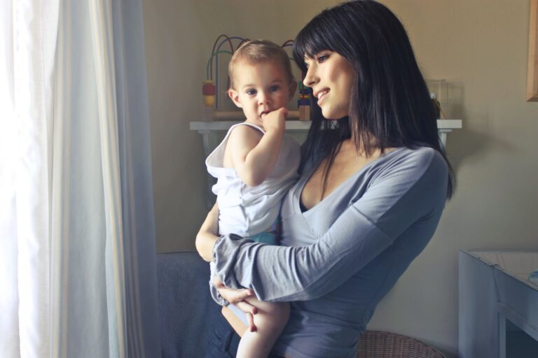 a loving moment between a mother and her child in an indoor setting, fostering connection and warmth.