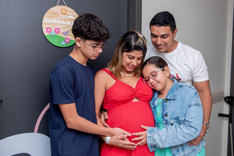 joyful family gathering, embracing new beginnings with a baby on the way.