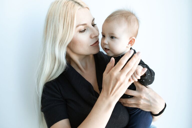 a tender moment of a mother holding her baby, showing love and connection.